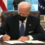 President Biden signing an Executive Order